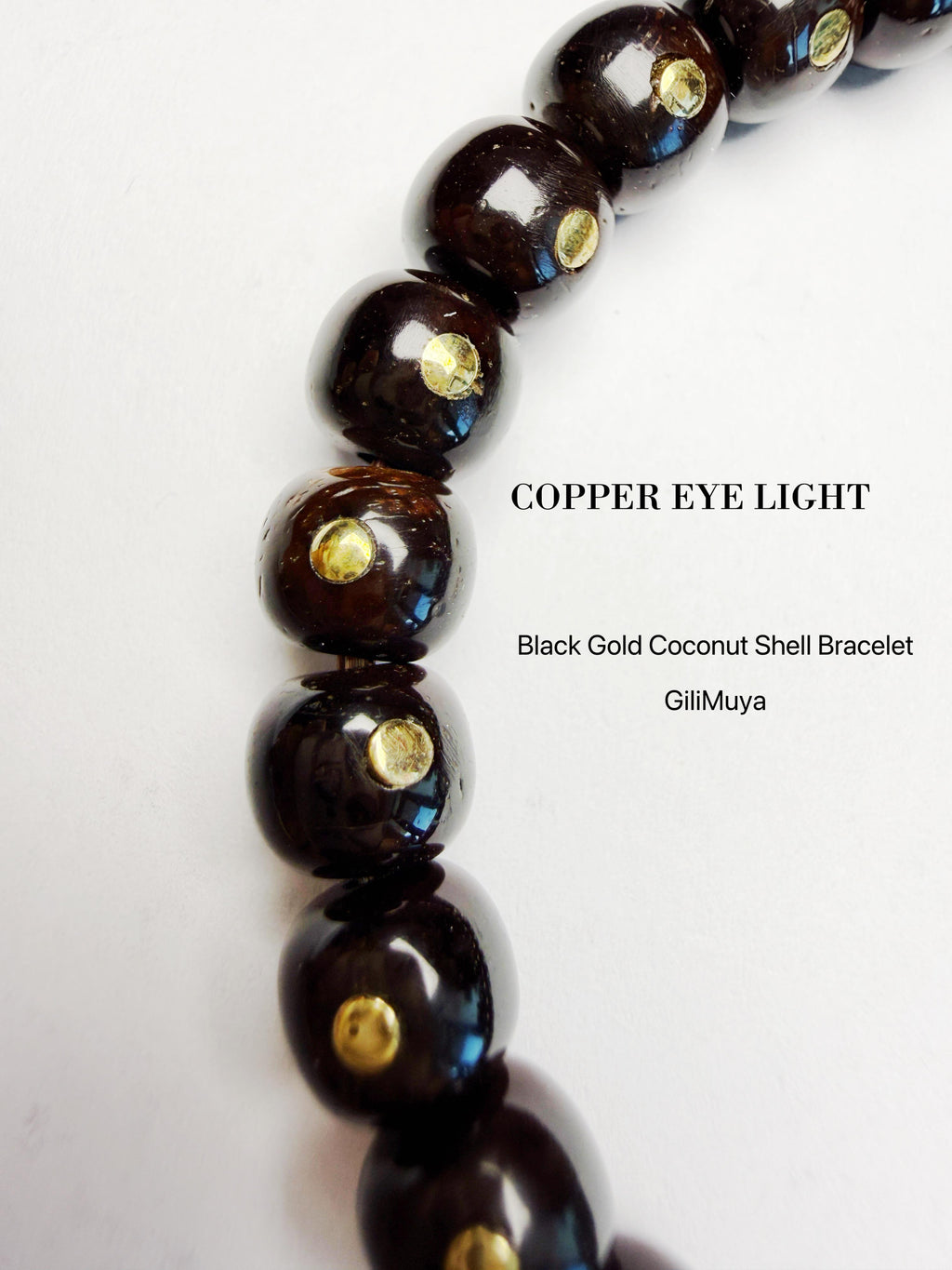Copper Eye Light‑Black‑Gold Coconut Shell Bracelet
