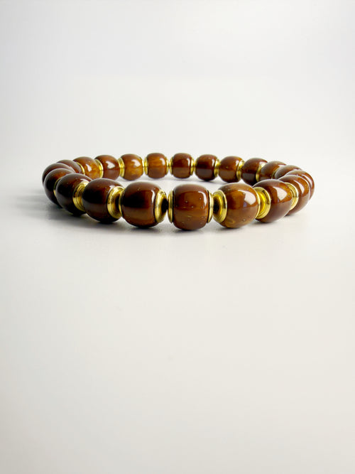 Fine Crafted 3-Eye Bodhi Beaded Bracelet with Brass Golden Shield Inlay