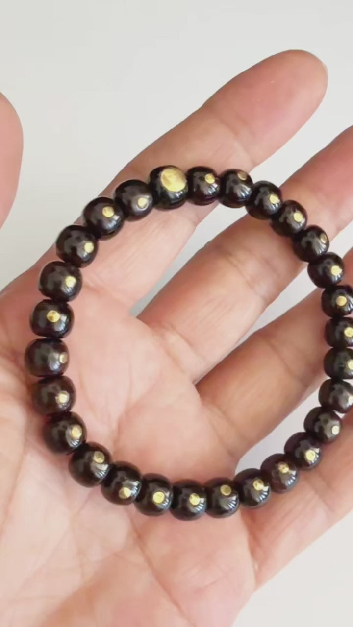 Copper Eye Light‑Black‑Gold Coconut Shell Bracelet